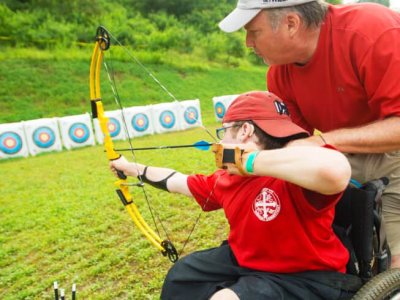 Participating in archery practice